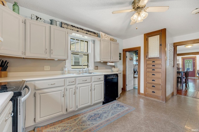 306 E Market St, Bluffton, IN 46714 - kitchen with black dishwasher, stainless steel range with electric stovetop, healthy amount of natural light, light countertops, and a textured ceiling