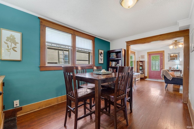 306 E Market St, Bluffton, IN 46714 - dining space with plenty of natural light, hardwood / wood-style flooring, ornamental molding, and a ceiling fan