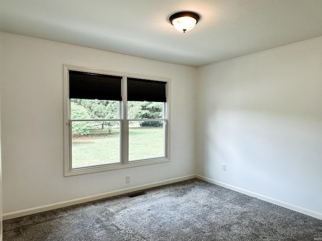 6133 E 800 N Rd, Denver, IN 46926 - carpeted empty room featuring baseboards