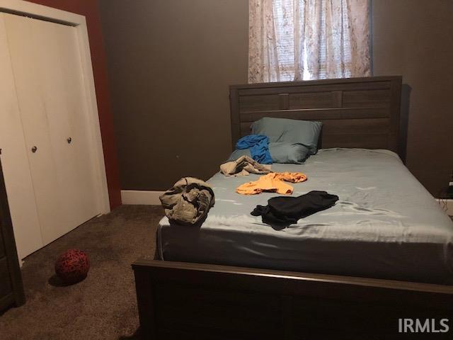 1124 N Maple St, Richland, IN 47634 - bedroom with carpet flooring and a closet