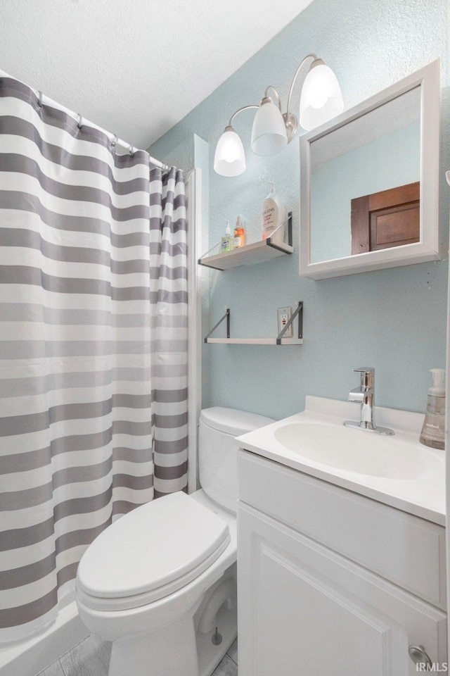 1234 Summit St, New Haven, IN 46774 - bathroom with vanity, a textured ceiling, and a shower with shower curtain