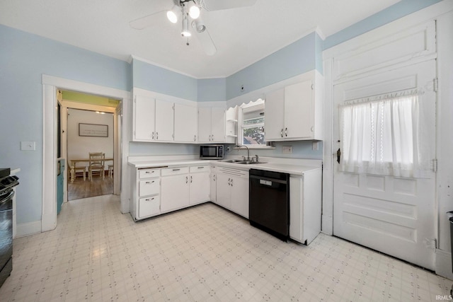1234 Summit St, New Haven, IN 46774 - kitchen with black dishwasher, light countertops, white cabinets, and light floors