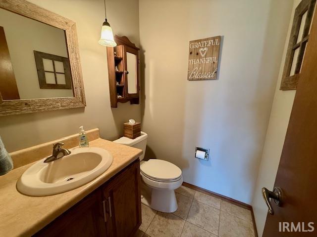 9910 Quachita Ct, Fort Wayne, IN 46804 - half bath with vanity and tile patterned flooring
