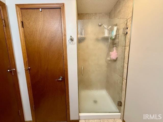 9910 Quachita Ct, Fort Wayne, IN 46804 - full bath with a shower stall and tile patterned flooring