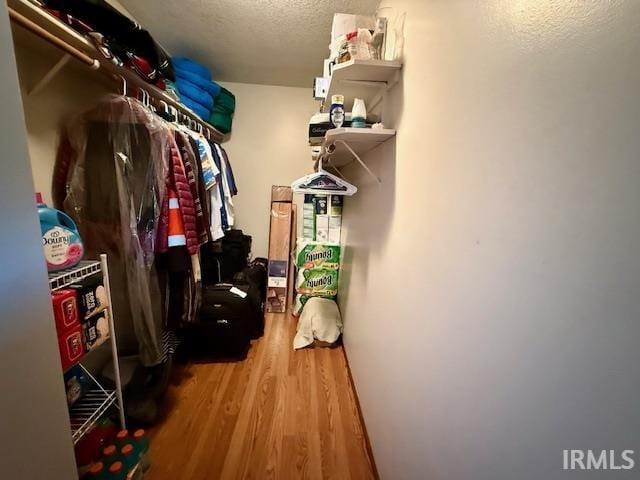 9910 Quachita Ct, Fort Wayne, IN 46804 - spacious closet featuring wood finished floors