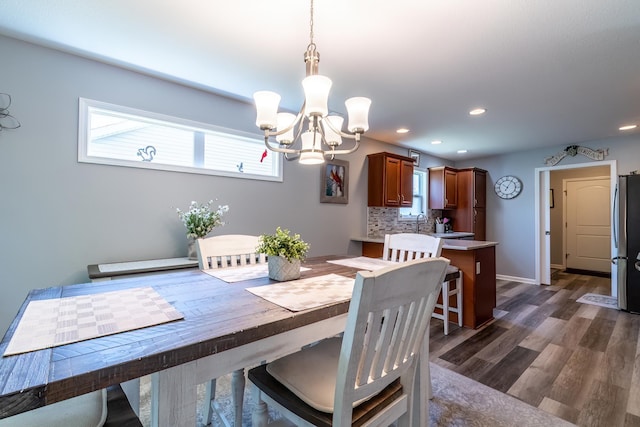 1709 Krebs Ct, Angola, IN 46703 - dining room featuring a chandelier, dark wood-style flooring, and recessed lighting