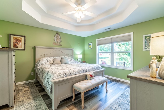 1709 Krebs Ct, Angola, IN 46703 - bedroom with a raised ceiling, wood finished floors, and a ceiling fan