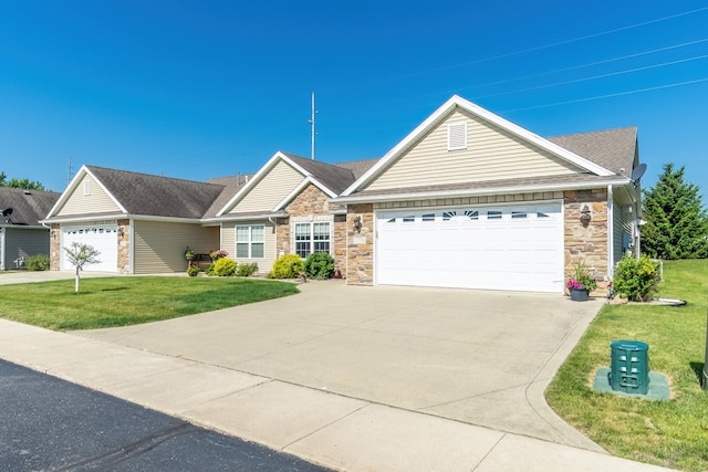 1709 Krebs Ct, Angola, IN 46703 - single story home with stone siding, a front lawn, a garage, and concrete driveway