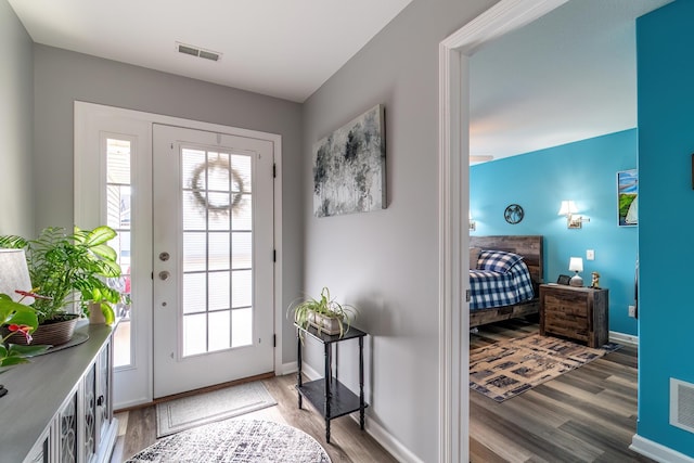 1709 Krebs Ct, Angola, IN 46703 - entrance foyer featuring wood finished floors and healthy amount of natural light