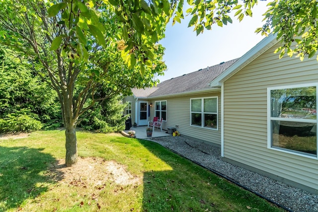 1709 Krebs Ct, Angola, IN 46703 - view of green lawn featuring a patio