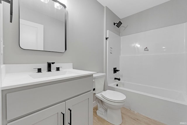 5960/62/64/66 N Clinton St, Fort Wayne, IN 46825 - bathroom featuring wood finished floors, vanity, and bathing tub / shower combination