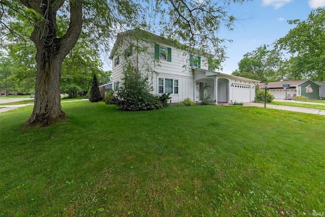 5033 Blackford Dr, South Bend, IN 46614 - view of front of property featuring an attached garage, concrete driveway, and a front yard