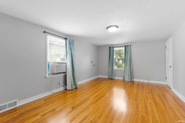 1150 Lexington Ave, Fort Wayne, IN 46807 - spare room with light wood-style floors and cooling unit