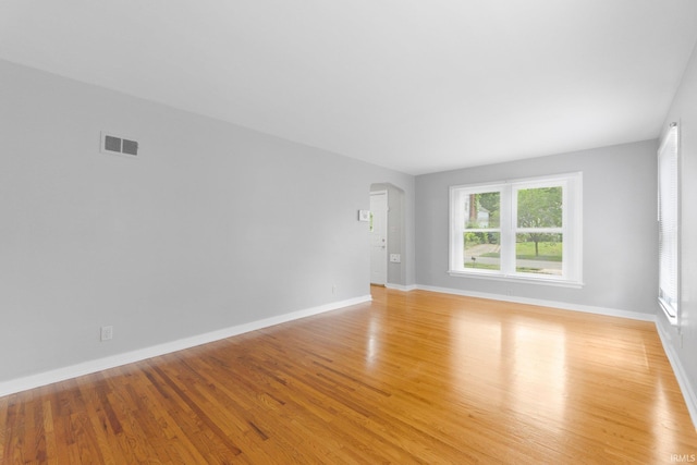 1150 Lexington Ave, Fort Wayne, IN 46807 - unfurnished room with arched walkways and light wood-type flooring