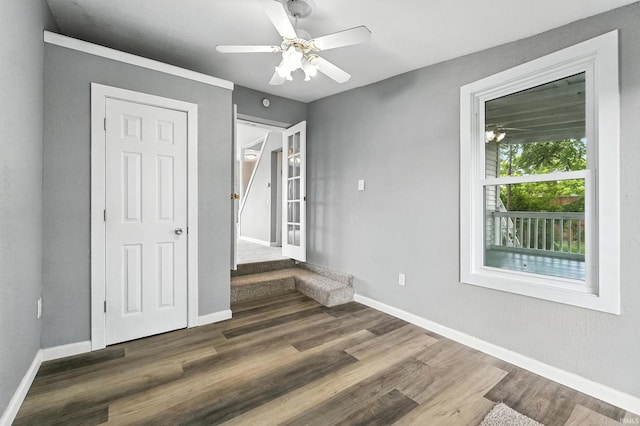615 E Main St, Butler, IN 46721 - unfurnished bedroom featuring wood finished floors and ceiling fan