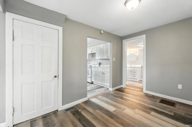 615 E Main St, Butler, IN 46721 - unfurnished dining area with wood finished floors
