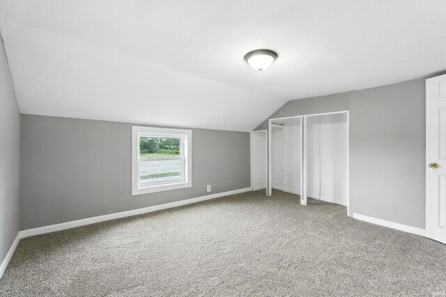 615 E Main St, Butler, IN 46721 - additional living space with lofted ceiling and carpet