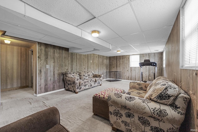 1827 N State Road 257, Otwell, IN 47564 - living area featuring wooden walls, a paneled ceiling, and carpet
