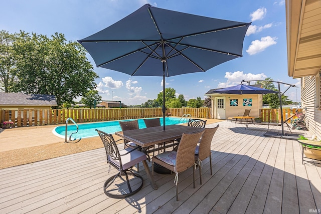 1827 N State Road 257, Otwell, IN 47564 - deck with a fenced backyard and outdoor dining space