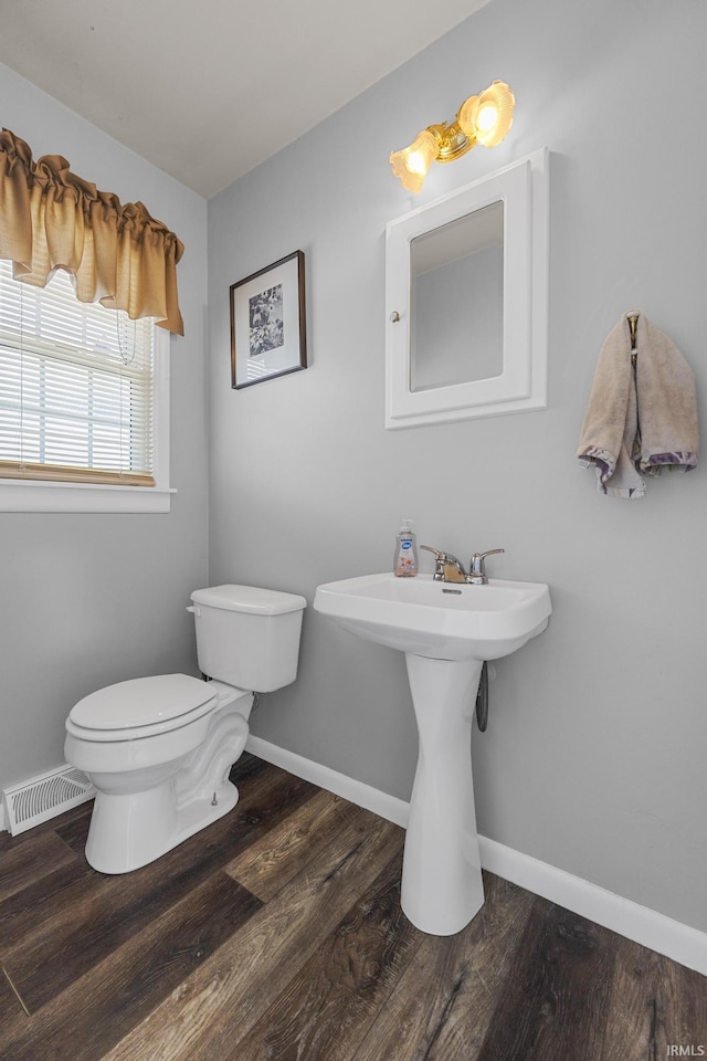 1827 N State Road 257, Otwell, IN 47564 - bathroom with toilet and wood finished floors