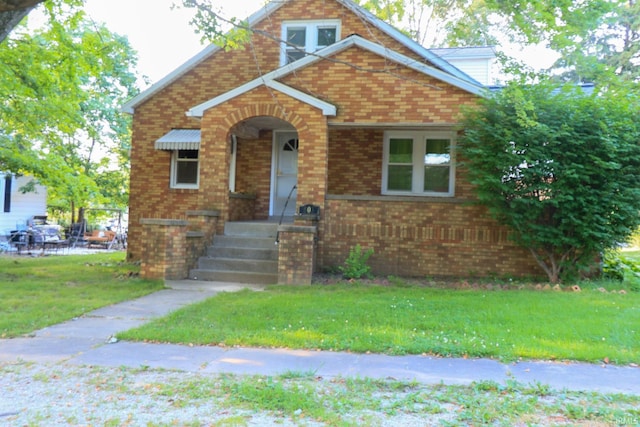 808 W Linn St, Holland, IN 47541 - view of front of house with brick siding and a front yard