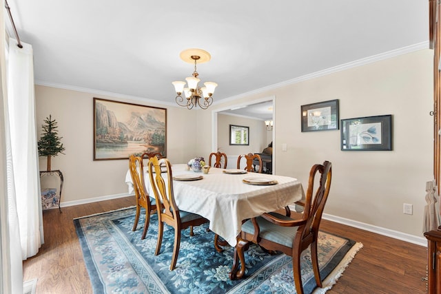 6521 Woodthrush Dr, Fort Wayne, IN 46835 - dining room featuring a chandelier, ornamental molding, and wood finished floors