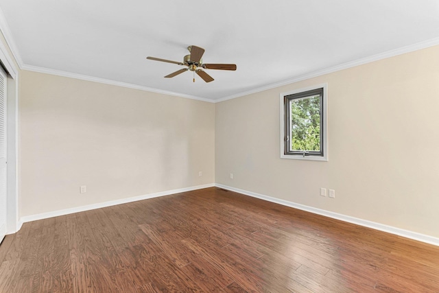 6521 Woodthrush Dr, Fort Wayne, IN 46835 - unfurnished room with dark wood-type flooring, crown molding, and a ceiling fan