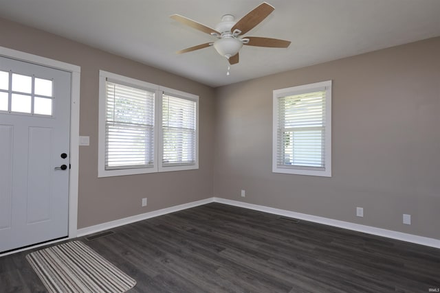 2114 S Branson St, Marion, IN 46953 - foyer entrance featuring plenty of natural light, dark wood-type flooring, and a ceiling fan