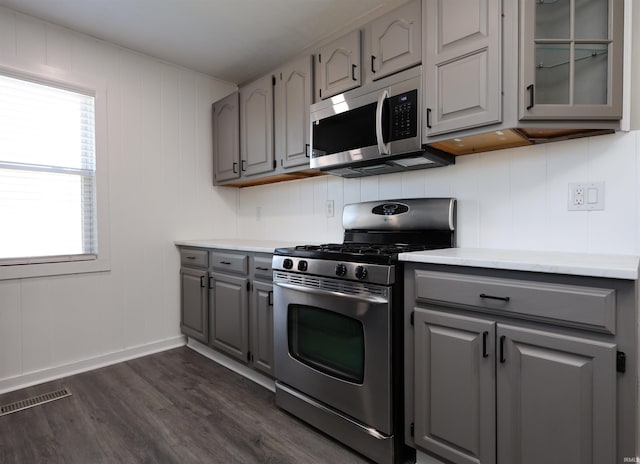 2114 S Branson St, Marion, IN 46953 - kitchen featuring gray cabinetry, appliances with stainless steel finishes, dark wood finished floors, and light countertops