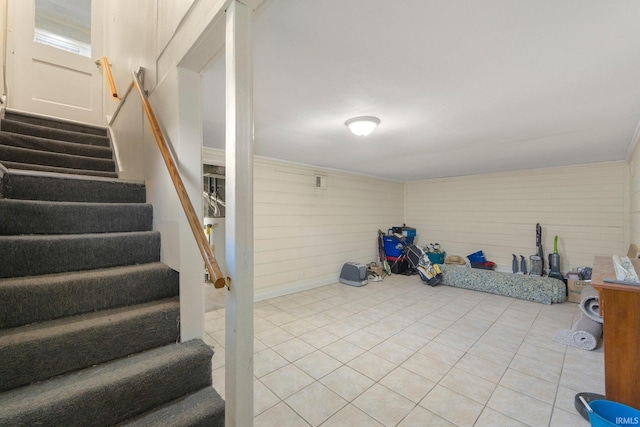 2001 N Anthony Blvd, Fort Wayne, IN 46805 - below grade area featuring stairway and light tile patterned floors