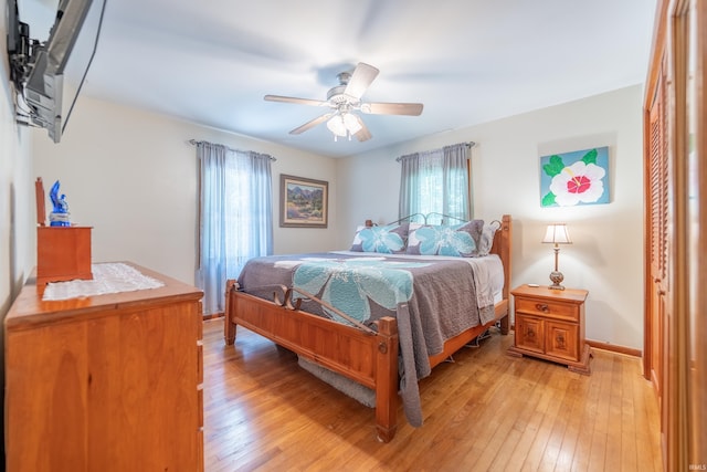 8099 S Breeden Rd, Bloomington, IN 47403 - bedroom featuring light wood-style floors and a ceiling fan