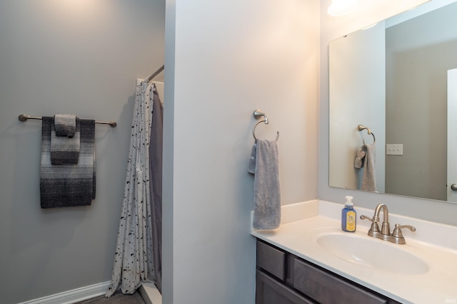 3951 W Nimita Ct, Bloomington, IN 47404 - bathroom featuring vanity and a shower with curtain