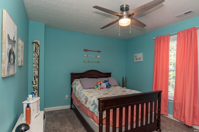 3951 W Nimita Ct, Bloomington, IN 47404 - carpeted bedroom featuring baseboards and a ceiling fan