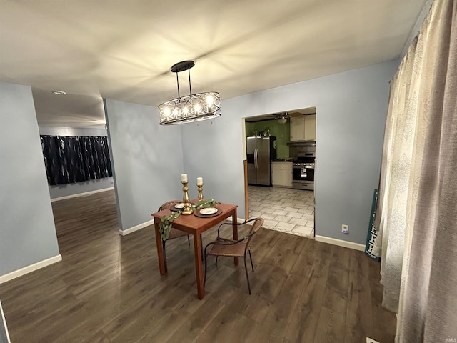 1015 Timbercrest Dr, Logansport, IN 46947 - dining room featuring dark wood-type flooring, ceiling fan, and recessed lighting