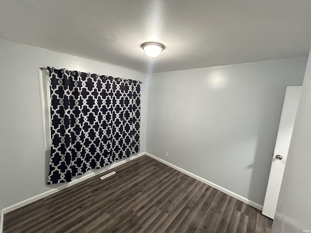 1015 Timbercrest Dr, Logansport, IN 46947 - spare room with dark wood finished floors