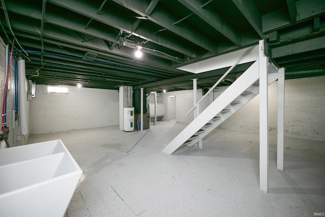 2606 Prast Blvd, South Bend, IN 46628 - below grade area featuring stairs and heating unit