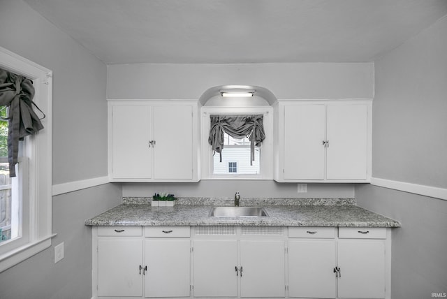 2606 Prast Blvd, South Bend, IN 46628 - kitchen with a sink and white cabinets