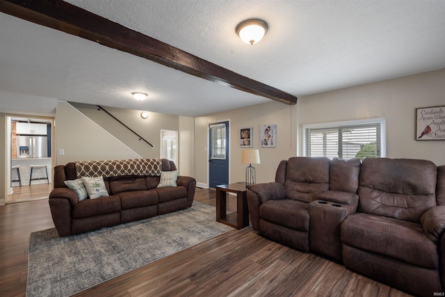 9462 W 1200 S 35, Marion, IN 46952 - living room with beamed ceiling, stairway, wood finished floors, and a textured ceiling