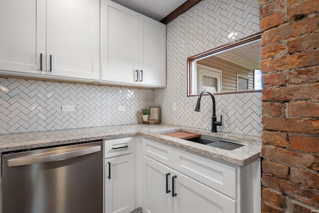 9462 W 1200 S 35, Marion, IN 46952 - kitchen with stainless steel dishwasher, tasteful backsplash, white cabinetry, and light stone counters