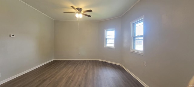 917 Wabash Ave, Vincennes, IN 47591 - spare room featuring healthy amount of natural light, ornamental molding, dark wood-style floors, and a ceiling fan