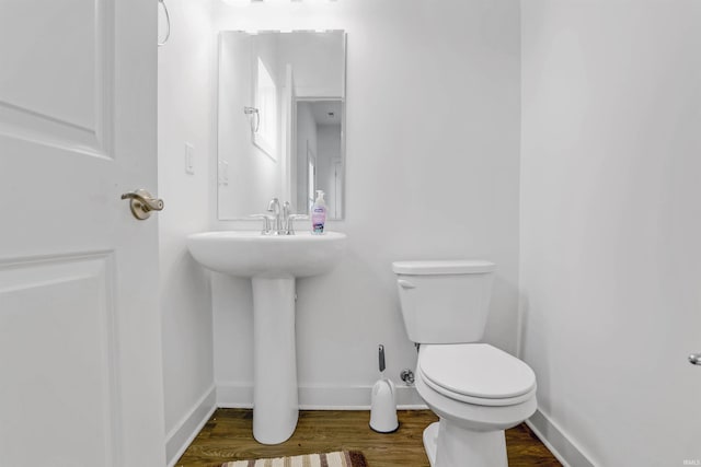 5355 Bloomsbury Ct, Newburgh, IN 47630 - half bathroom with toilet and wood finished floors
