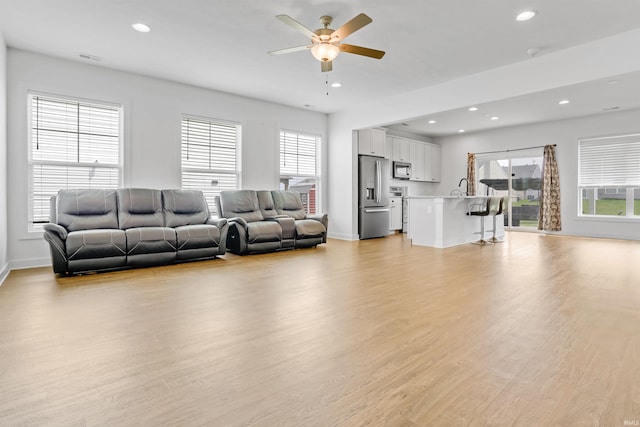 5355 Bloomsbury Ct, Newburgh, IN 47630 - living room with a ceiling fan, light wood-style flooring, and recessed lighting