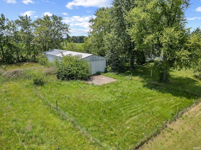 3192 N 150 W, Kokomo, IN 46901 - view of grassy yard featuring an outbuilding and an outdoor structure