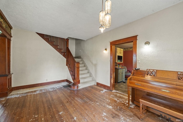 3192 N 150 W, Kokomo, IN 46901 - stairway featuring hardwood / wood-style flooring and a textured ceiling