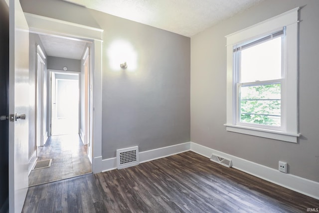 1110 Chalfant St, South Bend, IN 46617 - unfurnished room with dark wood finished floors and a textured ceiling