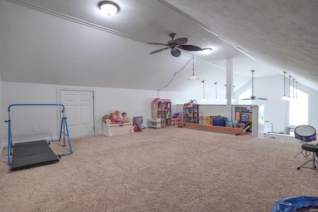 8558 E John Emery Rd, New Carlisle, IN 46552 - playroom featuring ceiling fan, lofted ceiling, carpet, and a textured ceiling