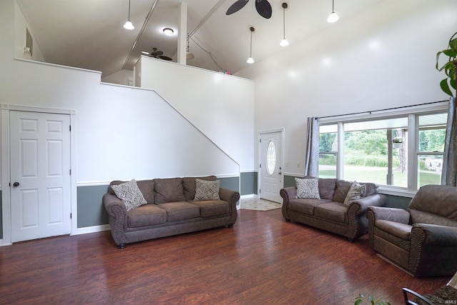 8558 E John Emery Rd, New Carlisle, IN 46552 - living room with high vaulted ceiling, wood finished floors, and a ceiling fan