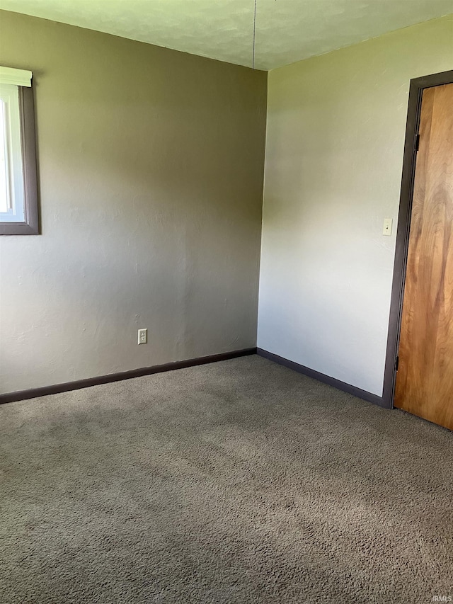 402 Charles St, Union City, IN 47390 - spare room featuring carpet and baseboards