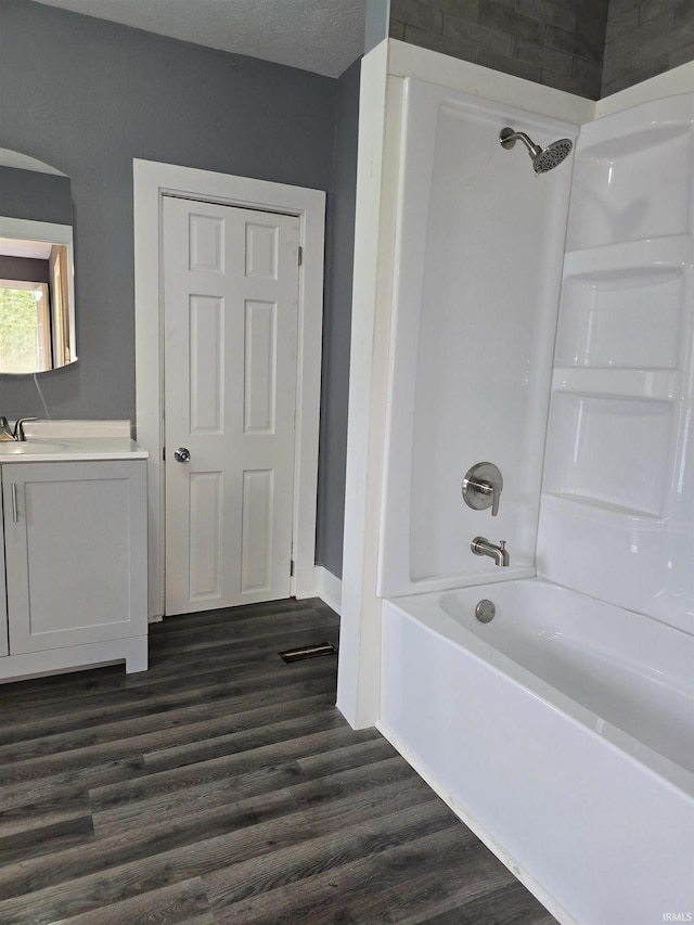 817 Mason St, Elkhart, IN 46516 - bathroom with  shower combination, vanity, and wood finished floors