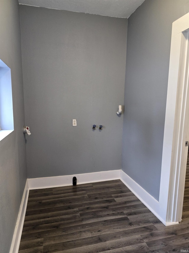 817 Mason St, Elkhart, IN 46516 - laundry room with baseboards and dark wood finished floors